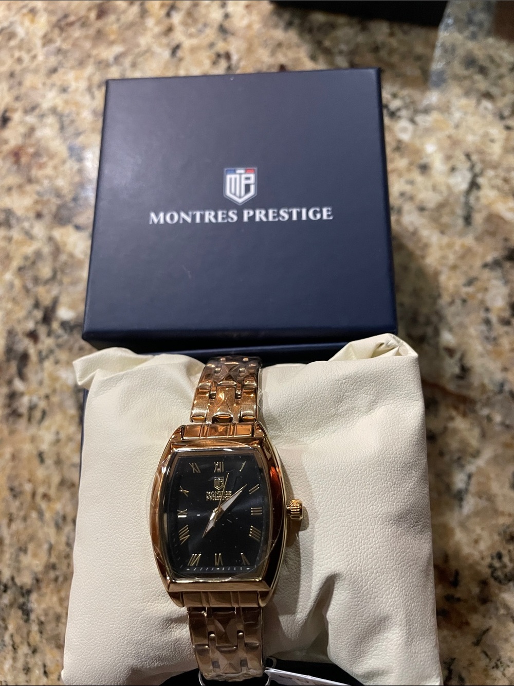 Montres Prestige Women's Gold Watch with Black Dial